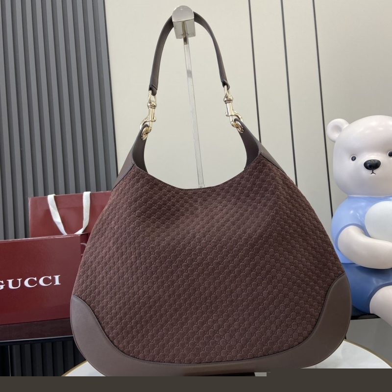 G*u*i top handle bags